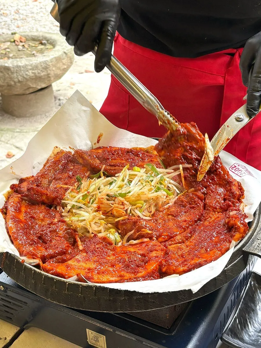Table set with tomato-jang pork belly spread