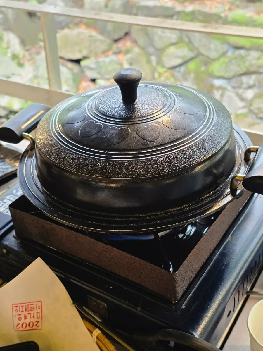Nearly emptied grill of tomato-jang pork belly
