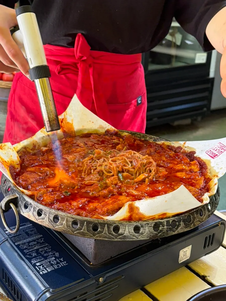 Warm japchae served before the meat
