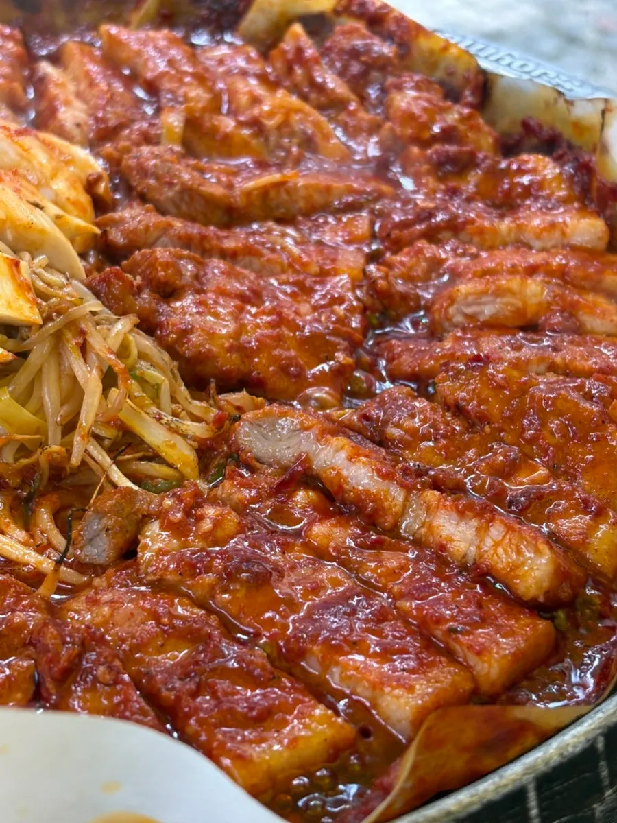 Pork belly topped with jar cheese