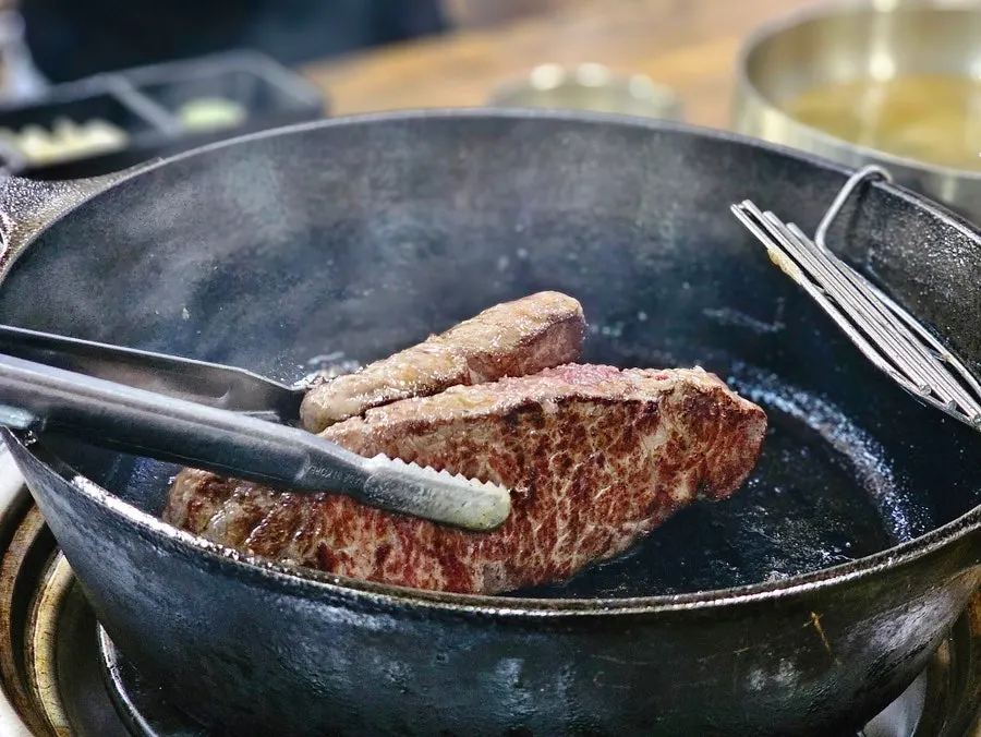 Owner grilling the hanwoo sirloin himself