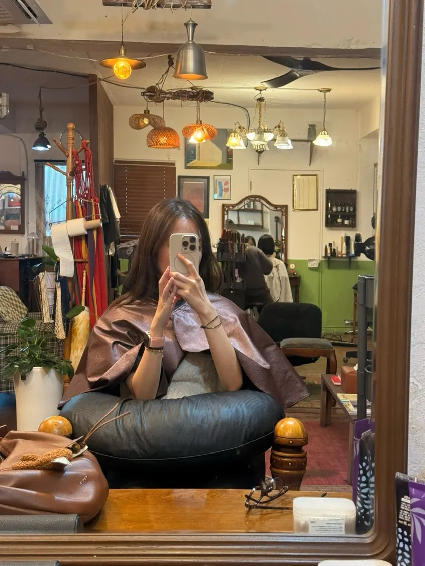 Hair receiving a clinic treatment before the root touch-up