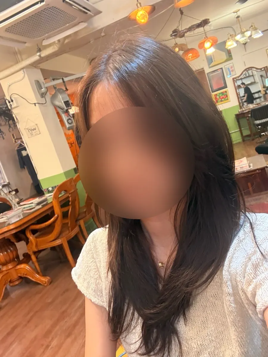 Hair after the root touch-up viewed from the front