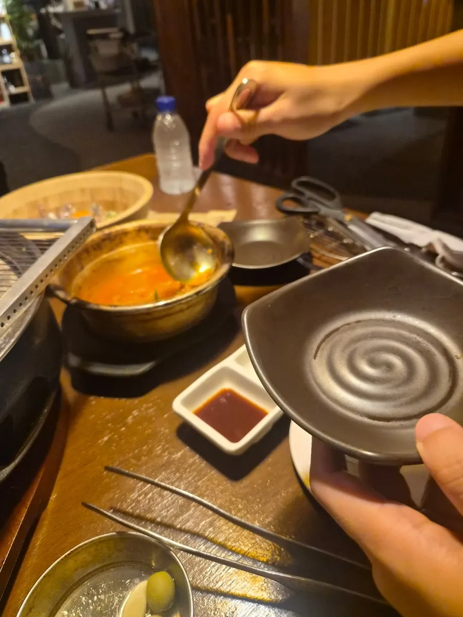Rib kimchi stew served in a small bowl