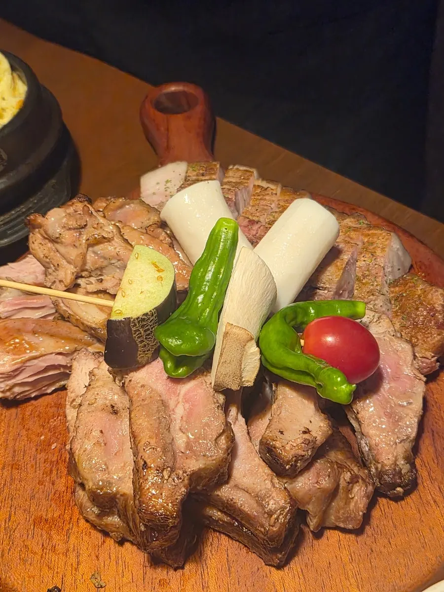 Smoked barbecue set on a wooden platter