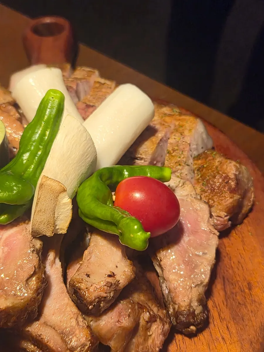 Barbecue platter with pork back ribs and vegetables
