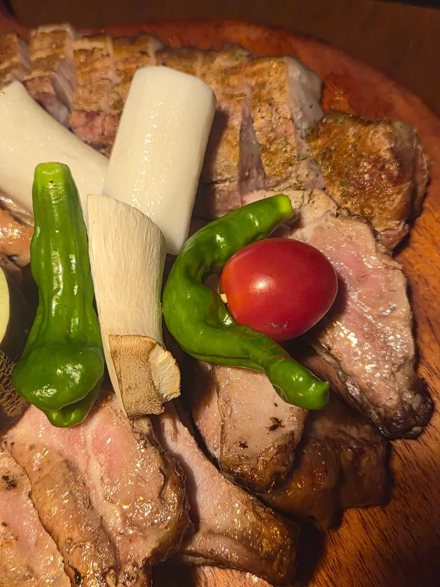 Smoked meat and grilling vegetables