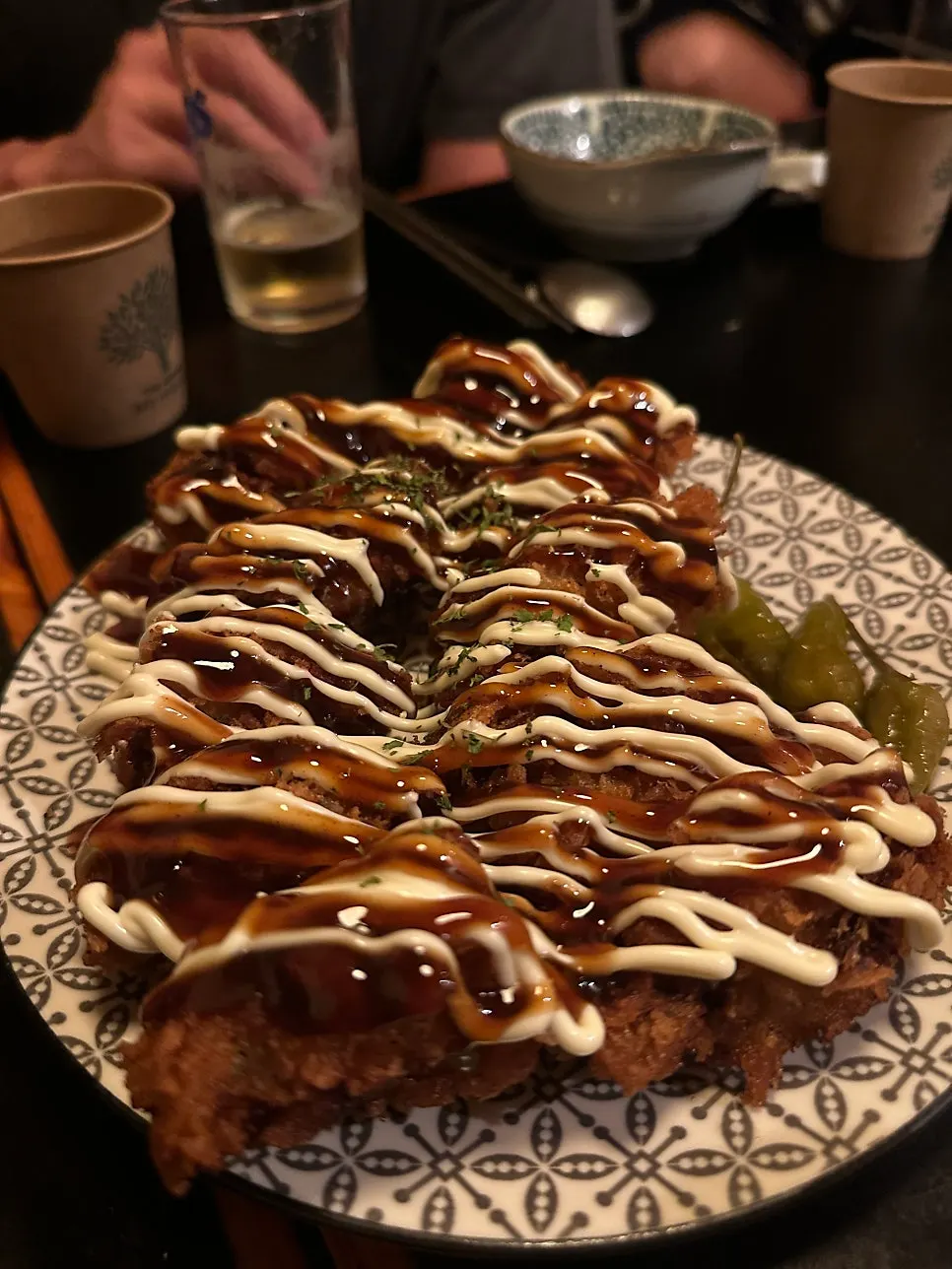 Fried oysters drenched in sauce