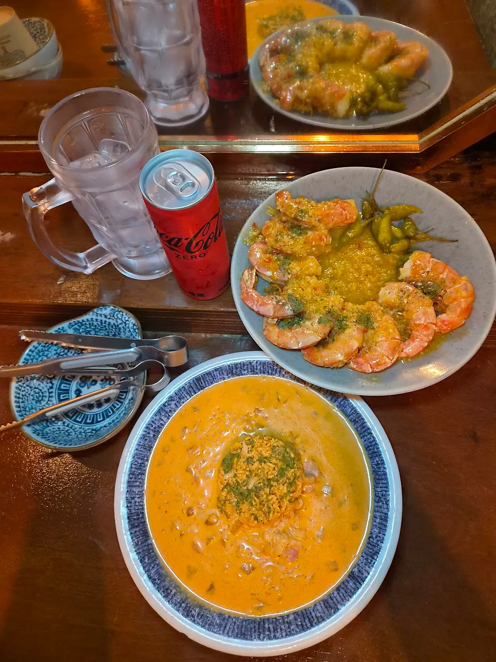 Table set with butter garlic king shrimp and shin ramyeon risotto