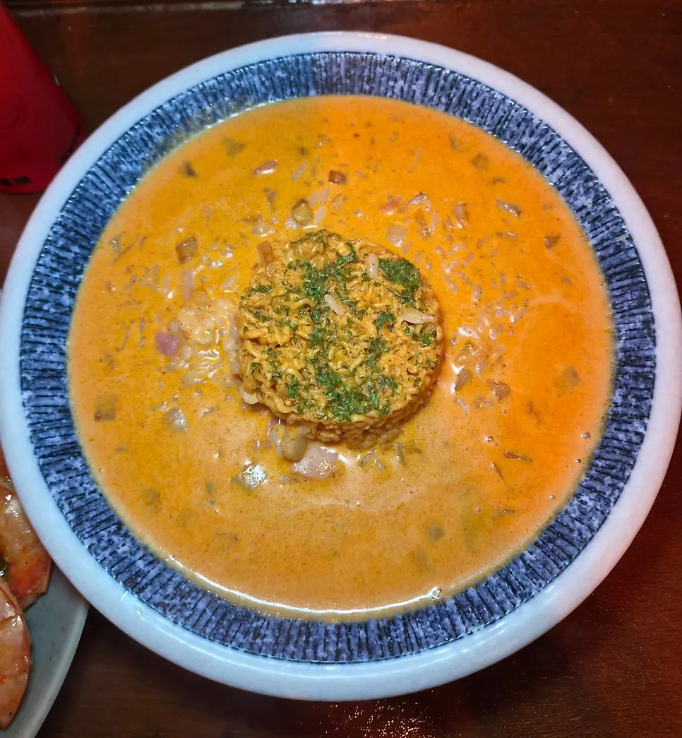 Shin ramyeon risotto with sauce, rice, and noodles combined