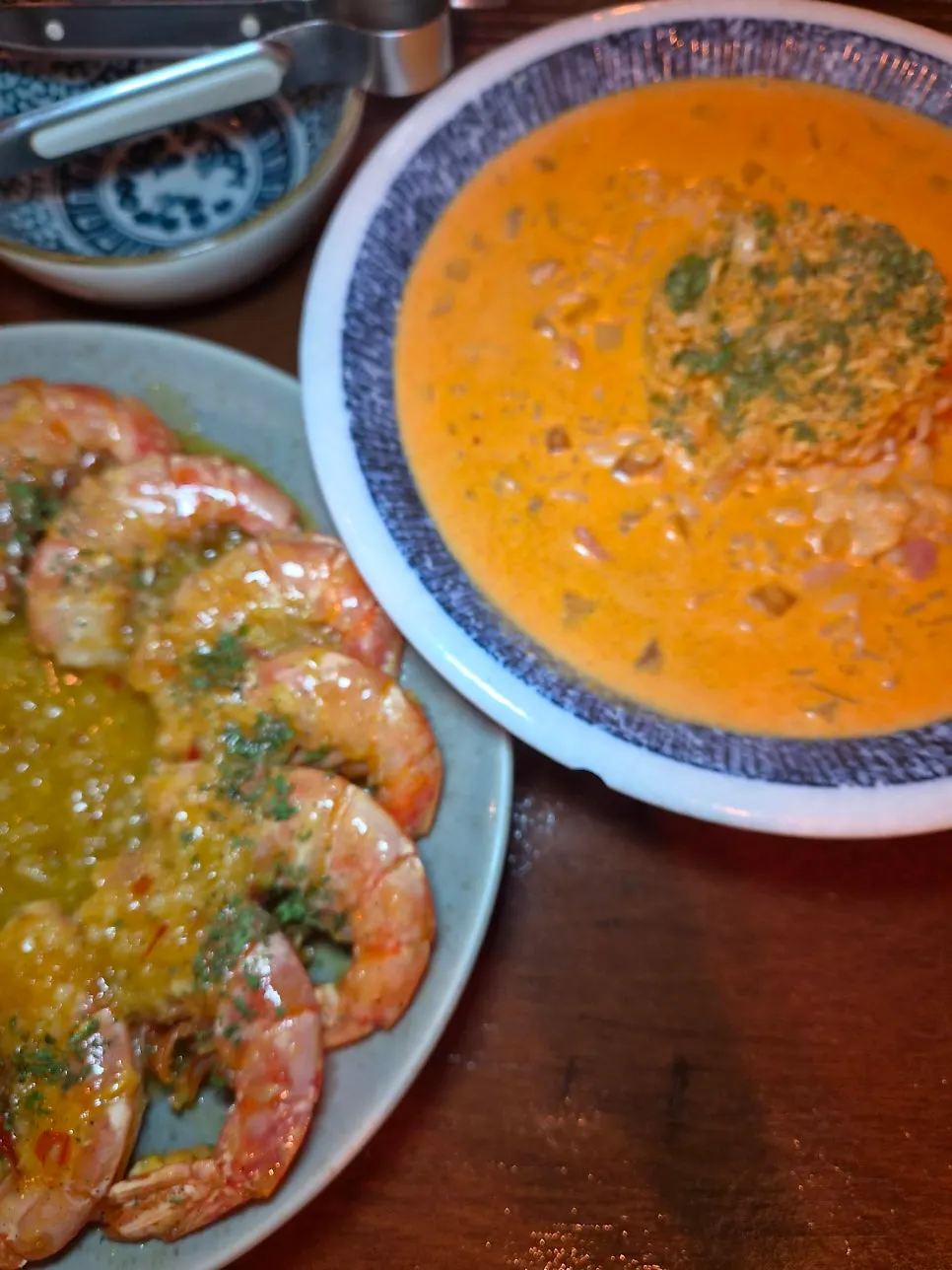Eating the butter garlic king shrimp and shin ramyeon risotto together