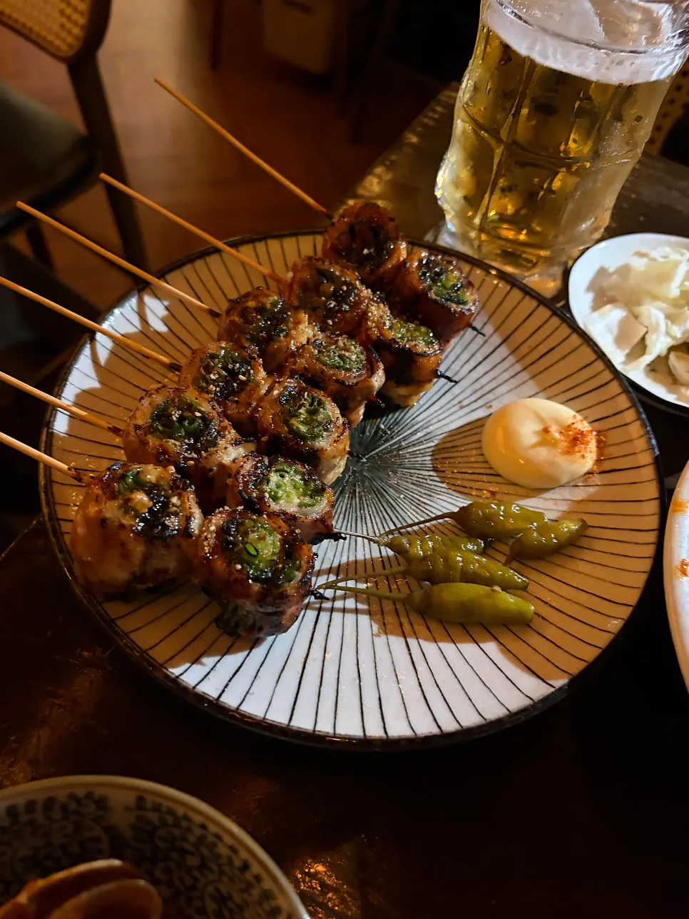 A plate of pork belly scallion skewers at Nani Byeolgwan