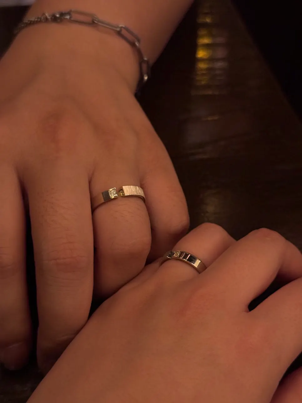 Wedding rings photographed on the table at Nani Byeolgwan