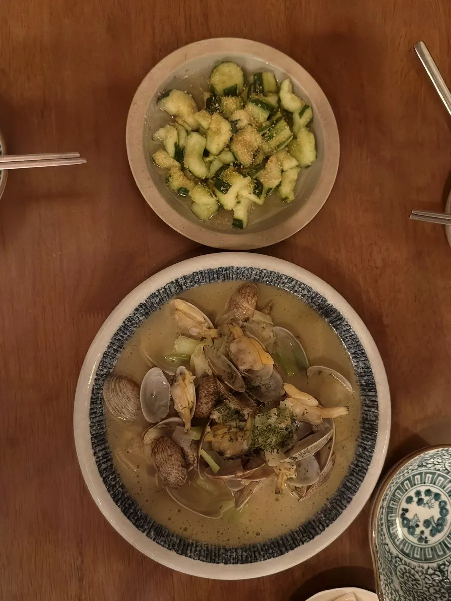 Basic table setting of water, small plates, and utensils