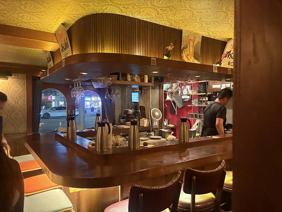 Side dishes and drinks on a table at Nani Byeolgwan Yeongdeungpo Branch