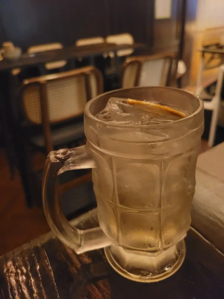 Soda water highball with ice and dried fruit