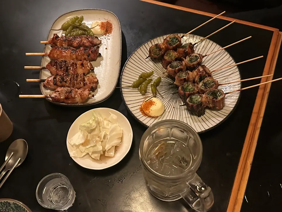 Drinks and basic sides laid out on the room table