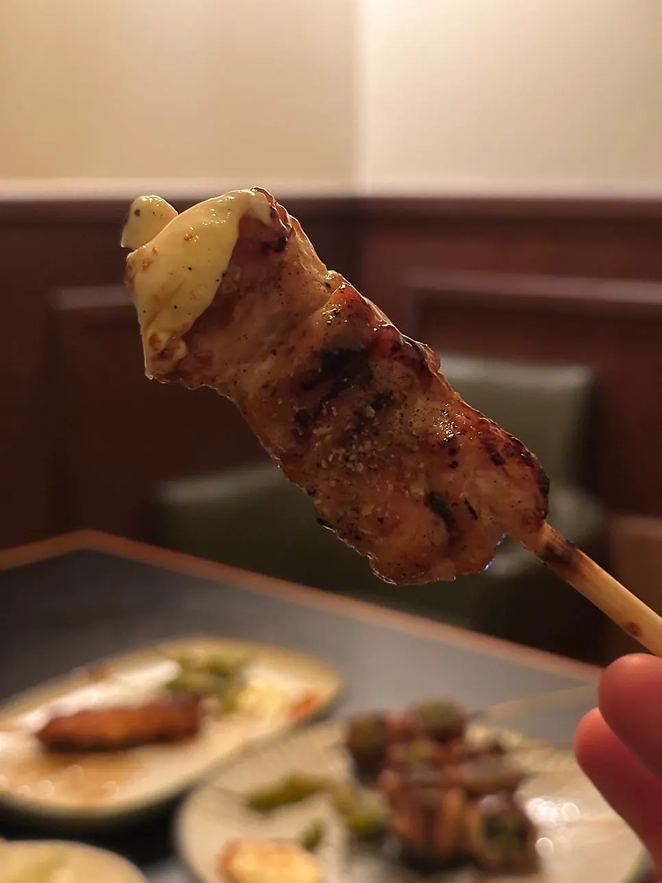 Close-up of the smoky-charred chicken skewers at Nani Byeolgwan
