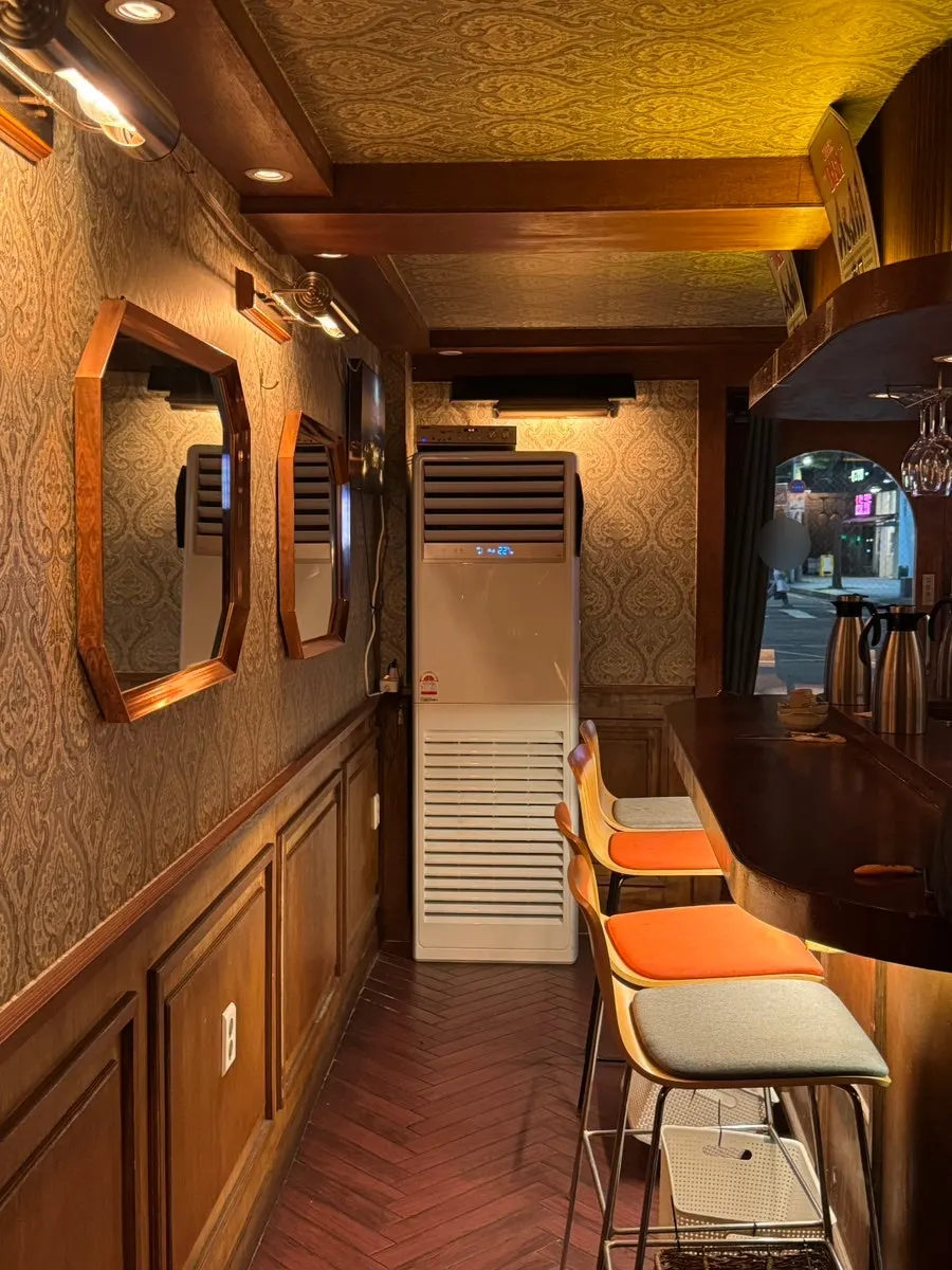 Bar counter seats under soft lighting
