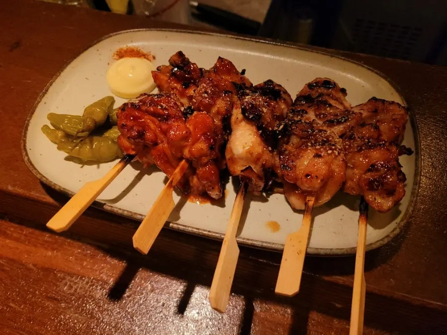Scallion pork belly skewer dipped in mayonnaise