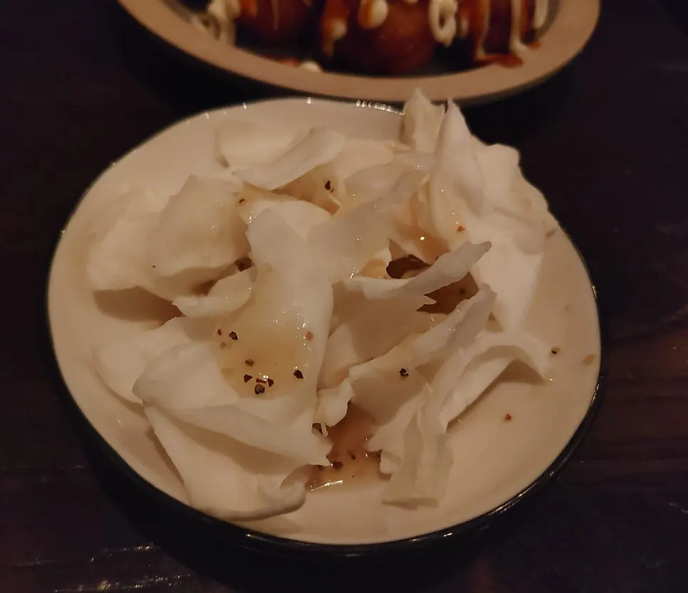 Cabbage salad served as a complimentary side