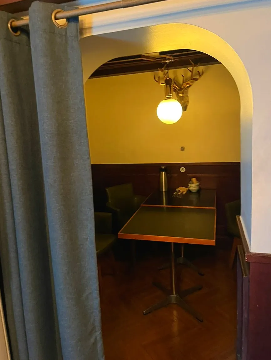 Curtained private seating area on the 2nd floor of Nani Byeolgwan