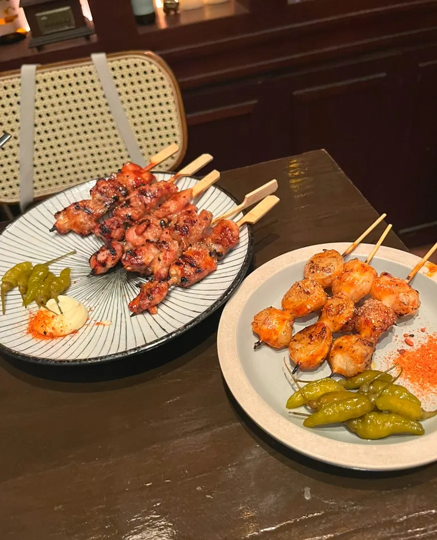 Five chicken skewers served with mayonnaise and mala powder