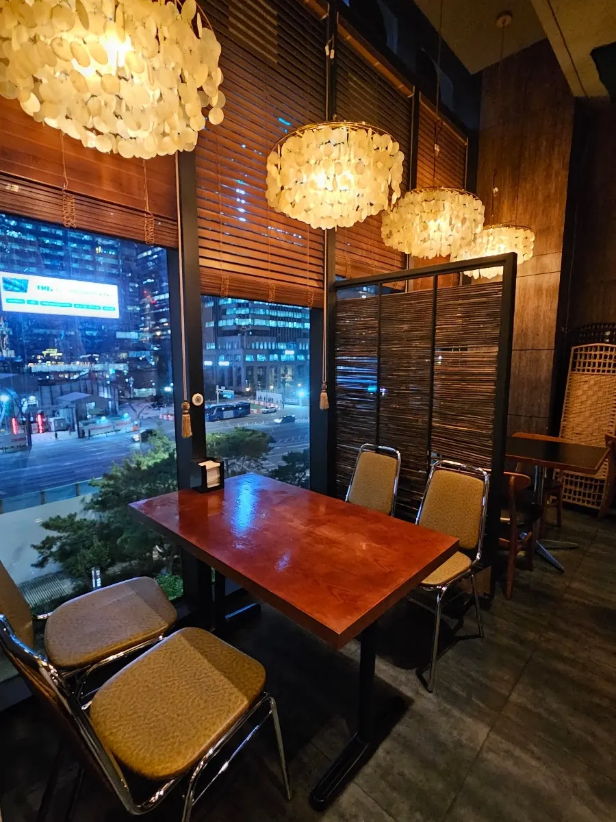 Interior view of Nani Yeouido Branch with floor-to-ceiling windows
