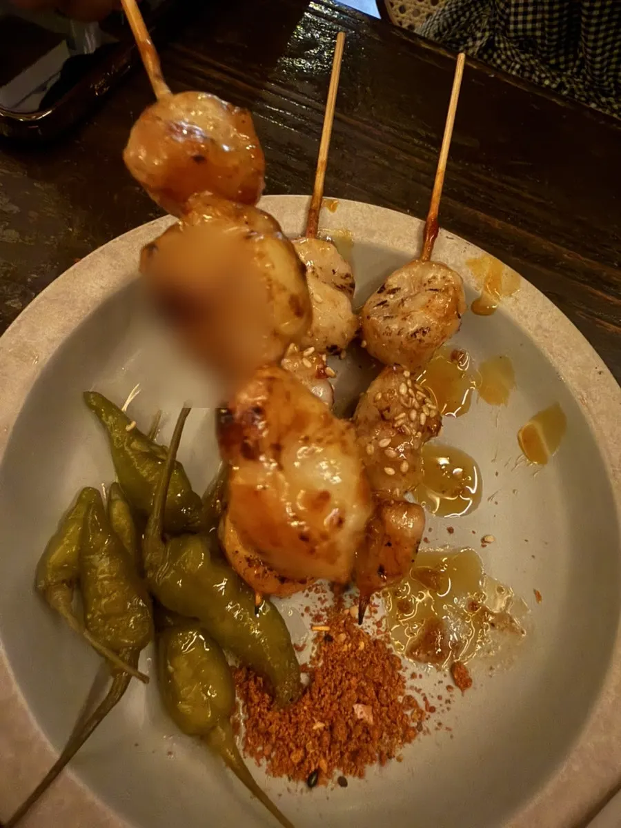 A plate of grilled daechang skewers