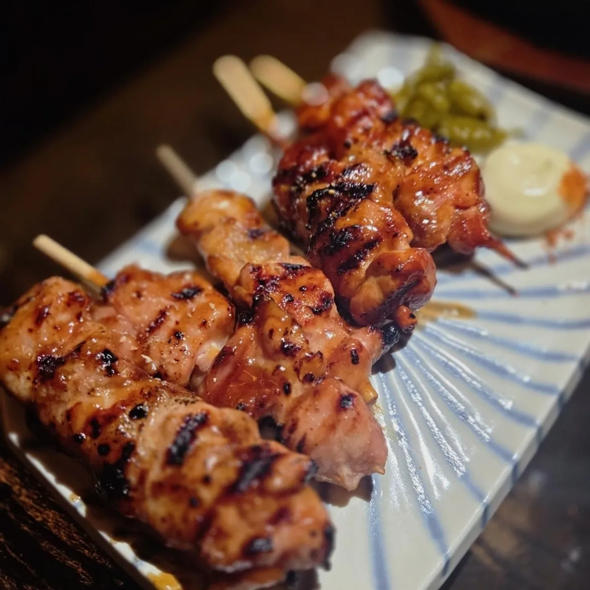 Chicken skewers served with mayo sauce