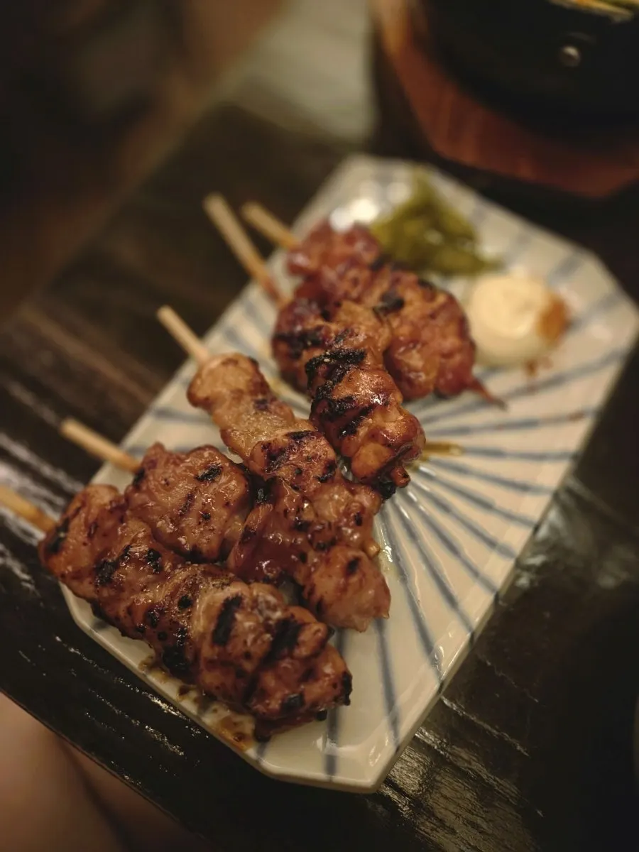 A generous plate of chicken skewers