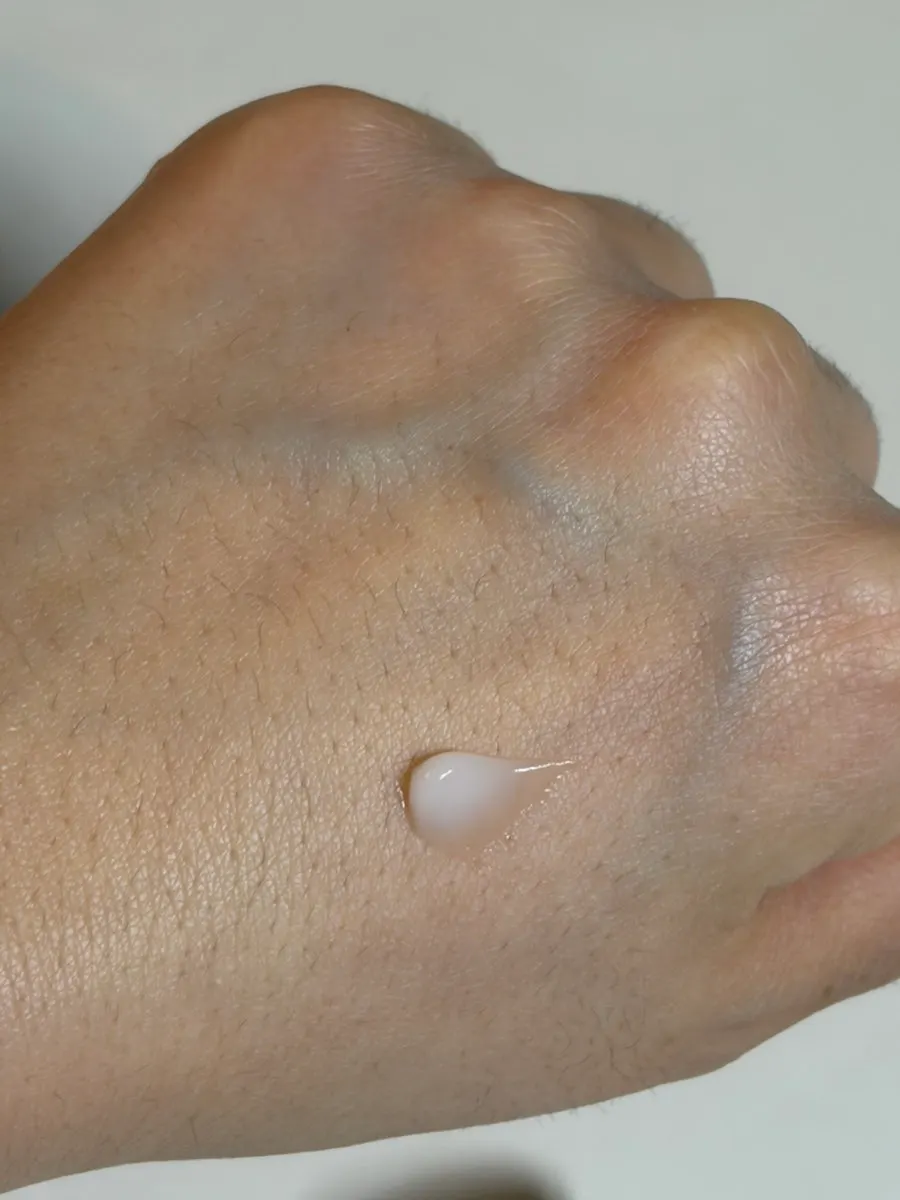 Applying moisturizing cream to skin