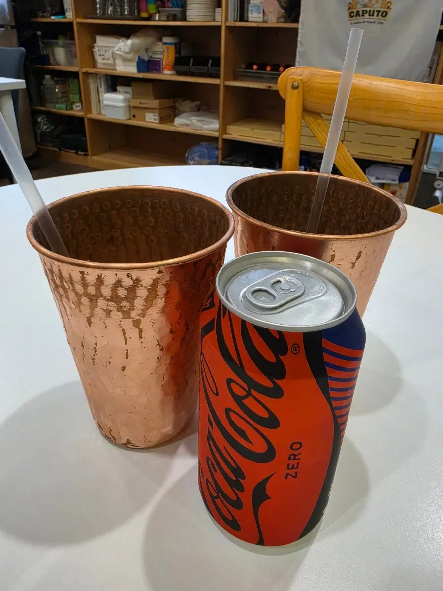A glass of cola with ice