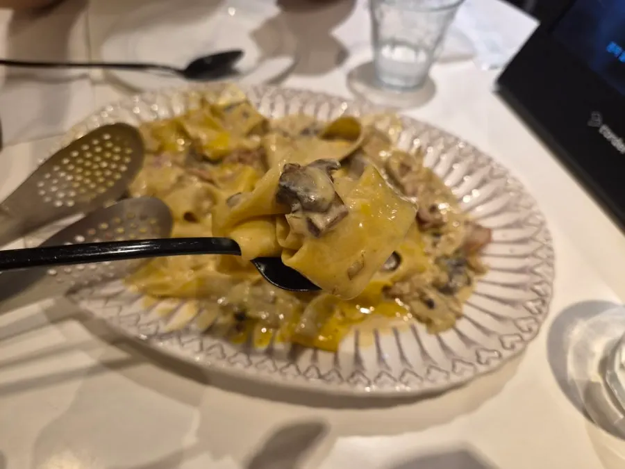 Carbonara pappardelle turned creamy after mixing in the egg yolk