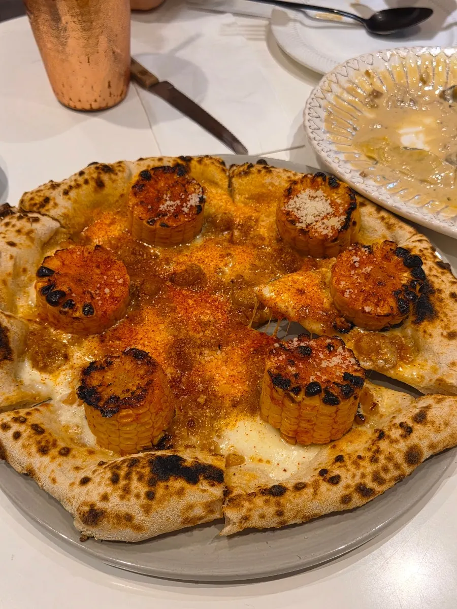 Close-up of the corn pizza toppings
