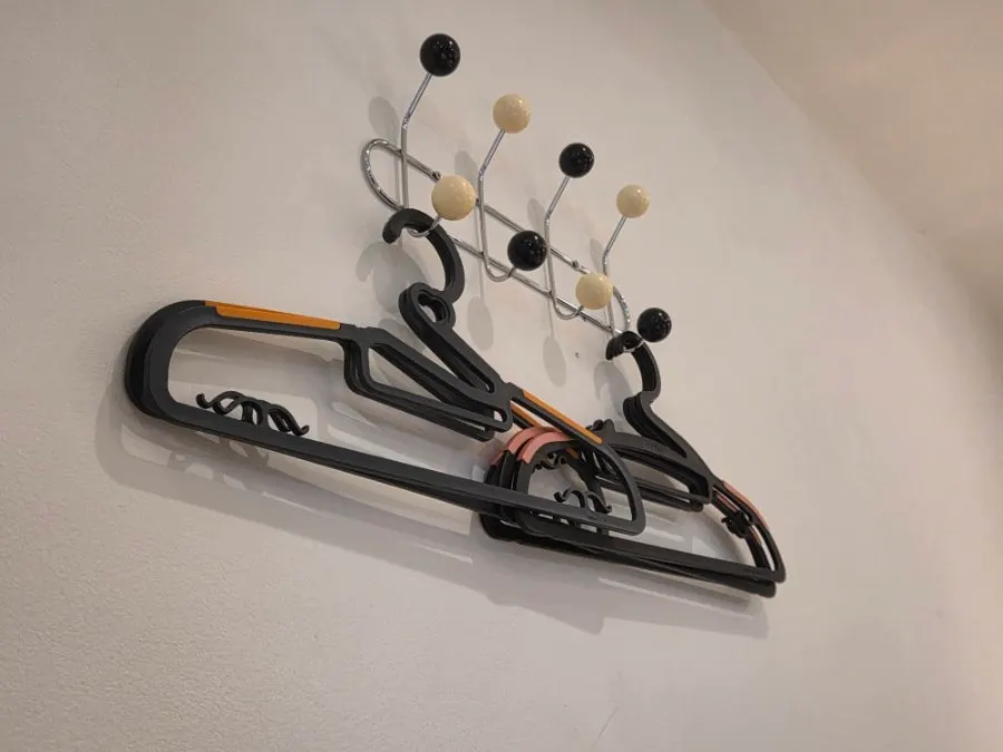 Coat hooks hanging on the restaurant wall