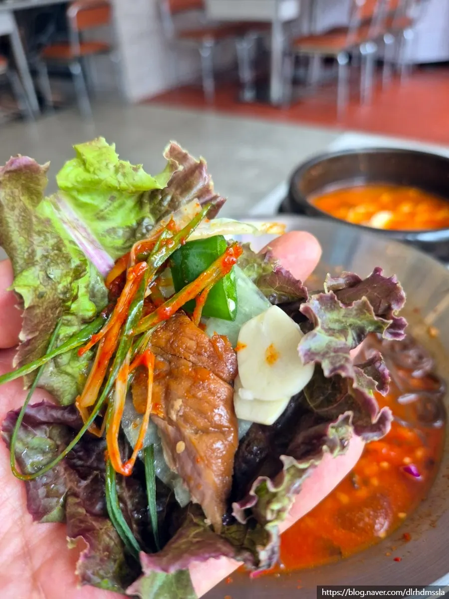 Jokbal placed on a piece of lettuce