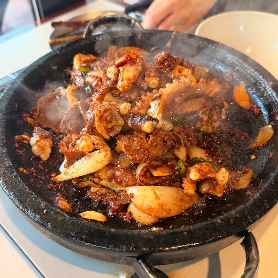 One whole live octopus in the dish