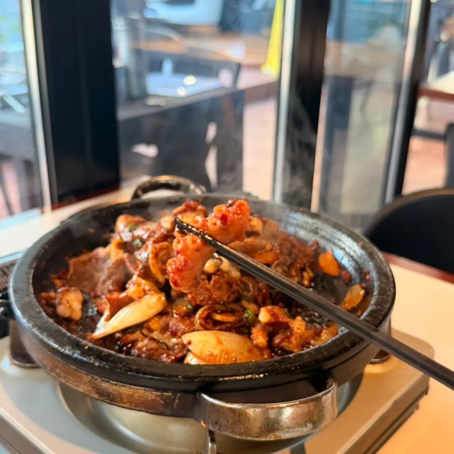 Lightly cooked live octopus stone grill