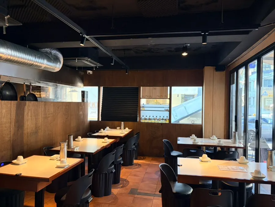 Interior seating at Negi Silbi Sinsa during evening hours