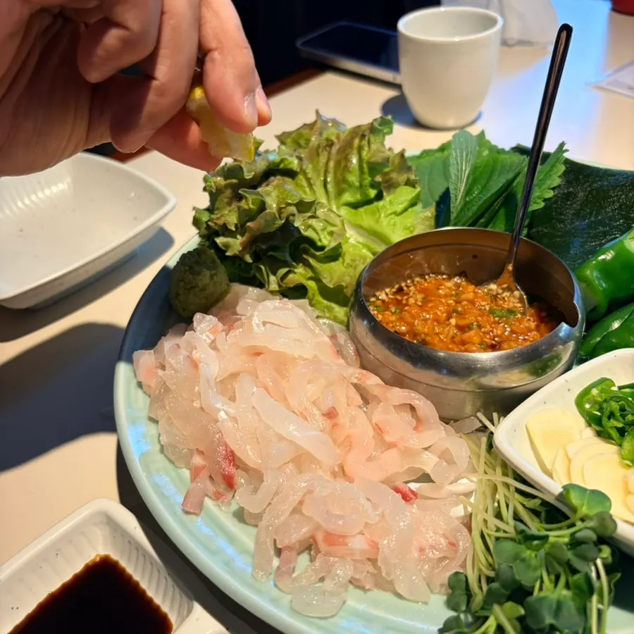 A portion taken from the sea bream sashimi