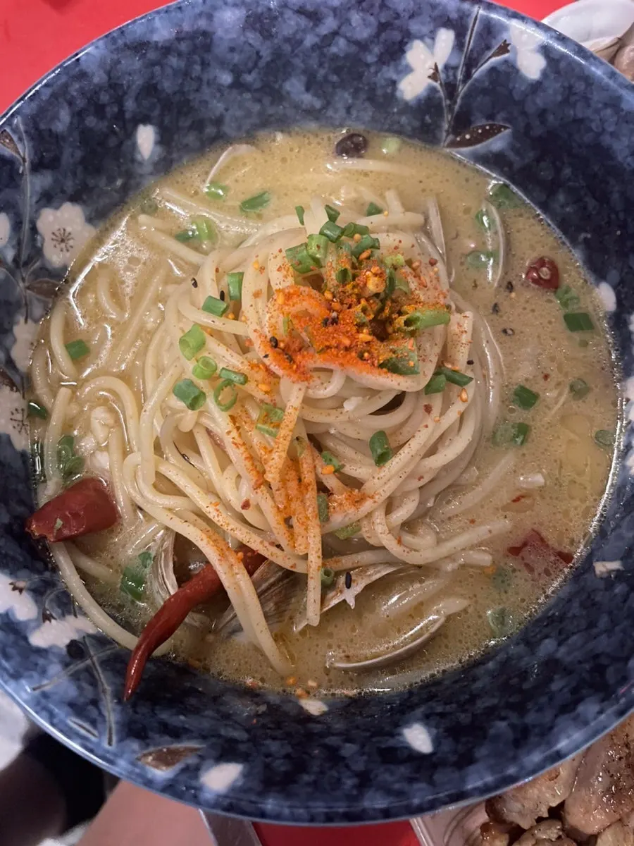 Pasta added to the clam hot pot