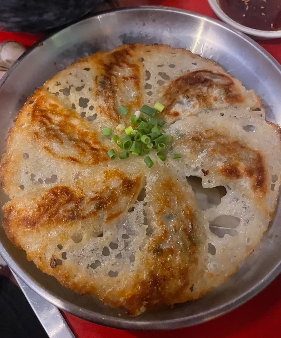 Hot pot pasta mixed into a vongole-style dish