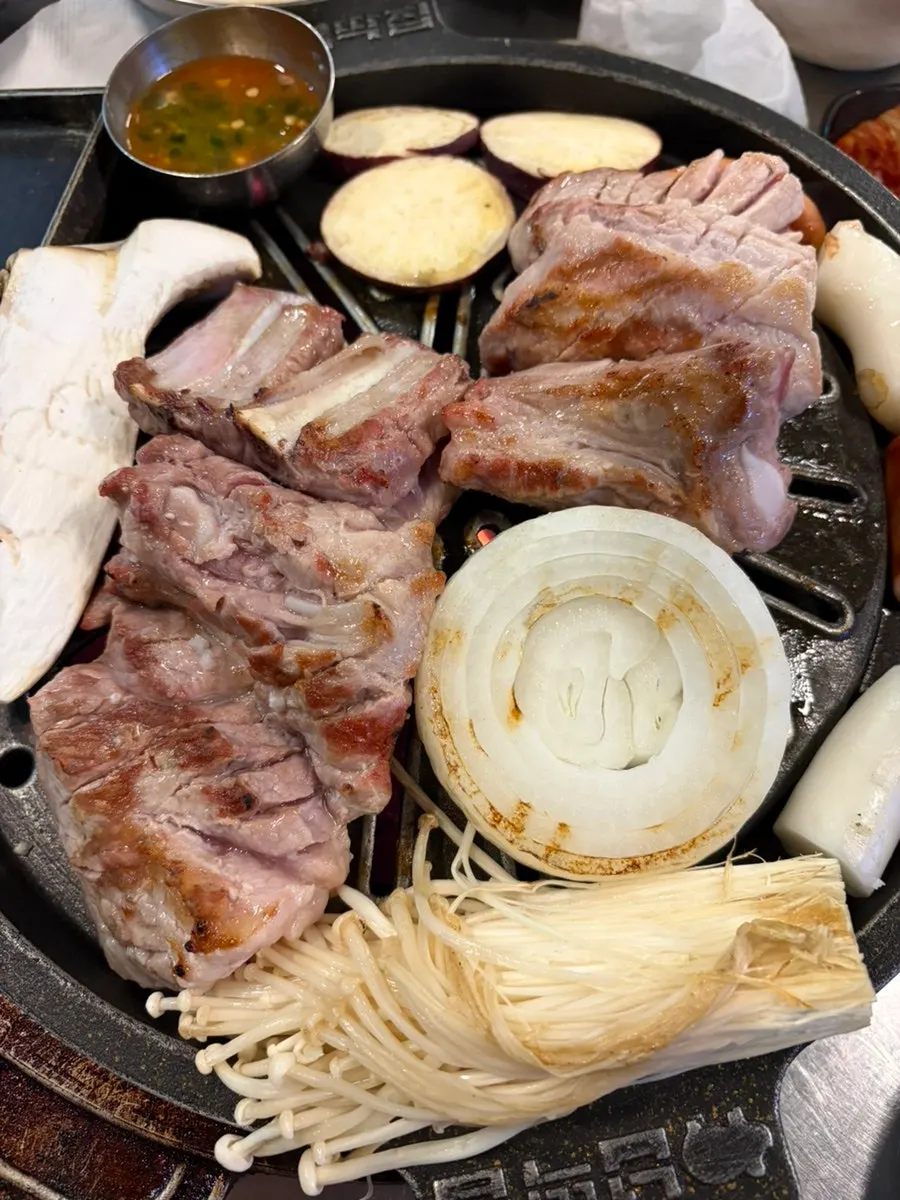 Grilled vegetables cooked alongside the meat