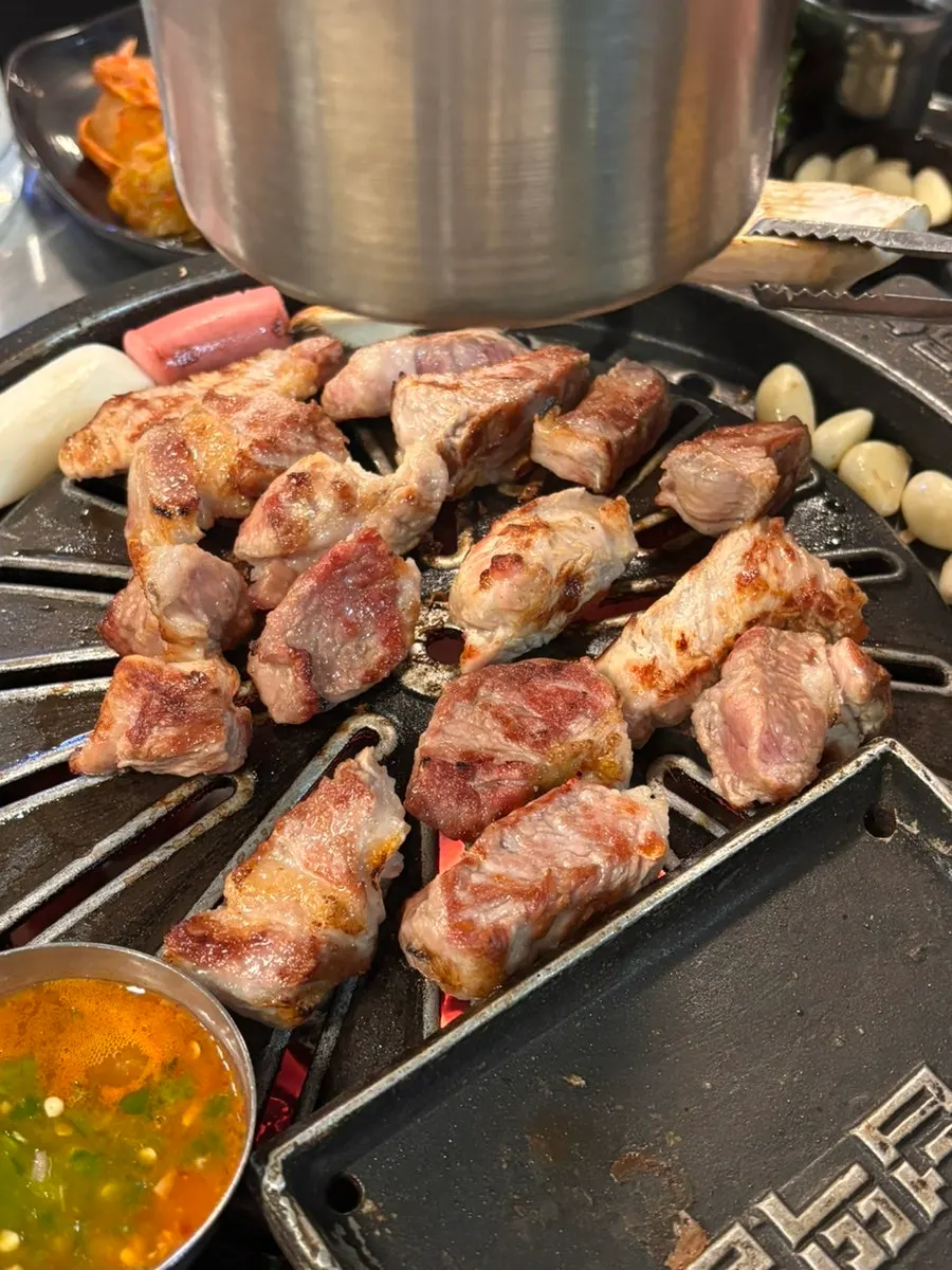 Pork belly and pork neck grilling on the plate