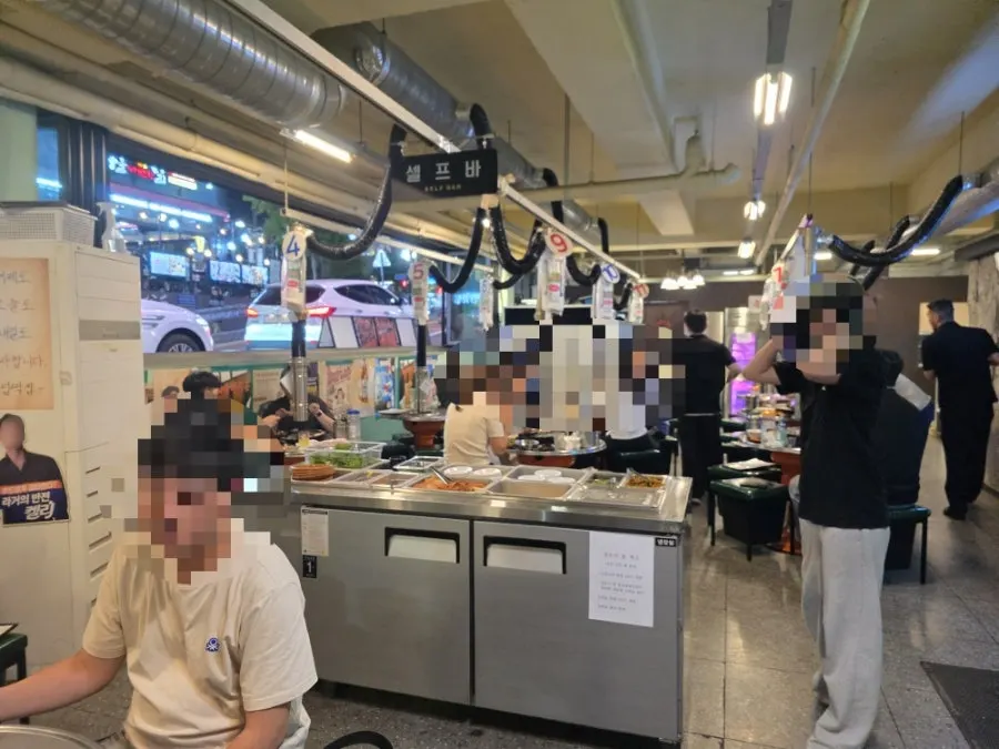 Interior of the restaurant with tables set for BBQ