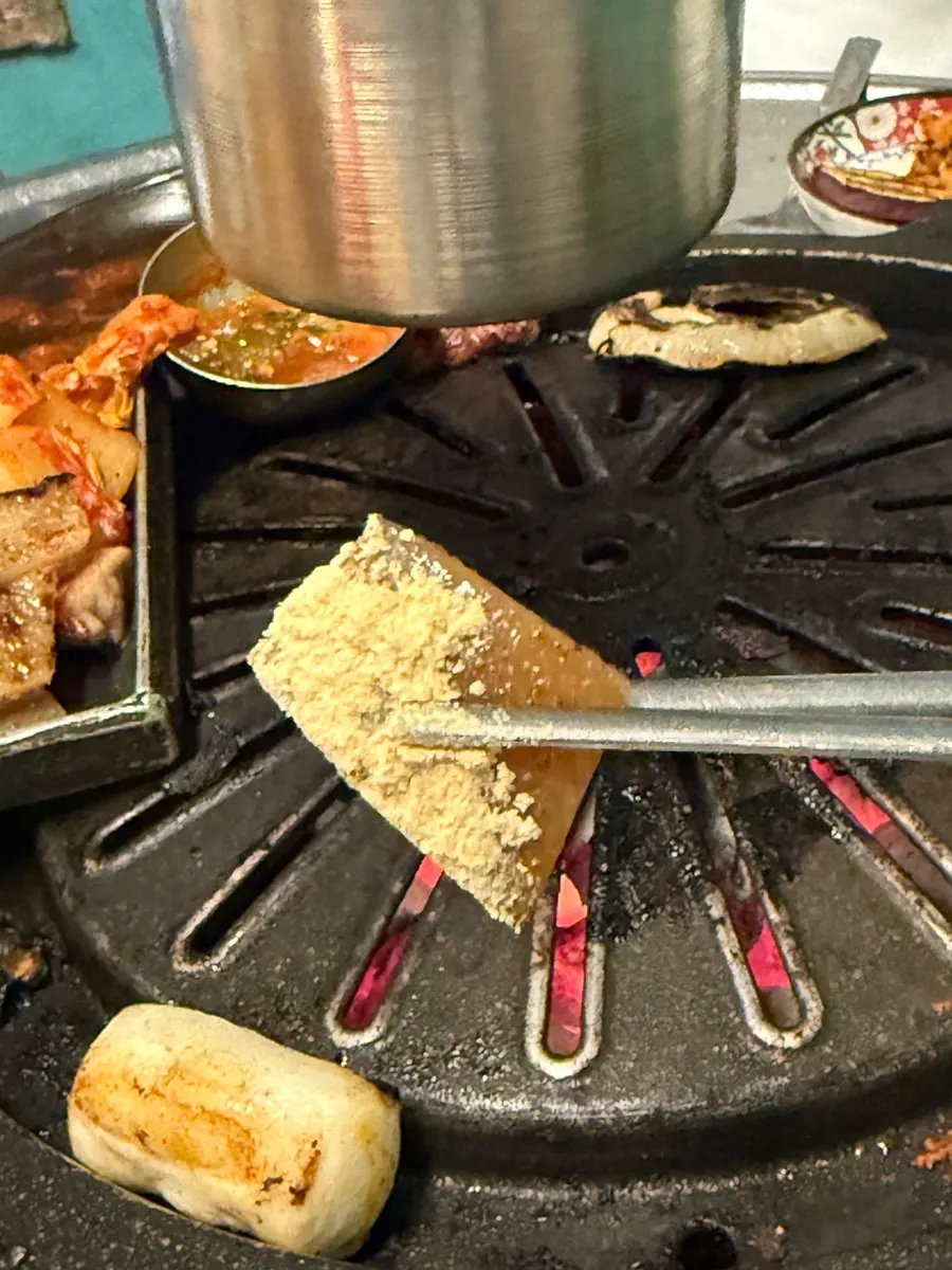 Three pieces of unscored pork skin grilling