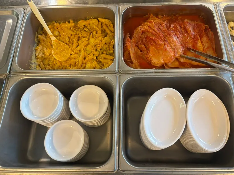 Ssamjang, garlic, and pepper corner at the self-serve bar