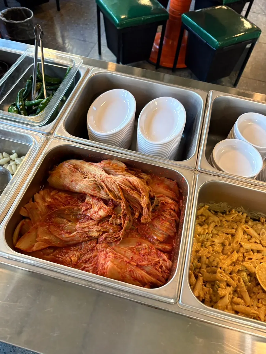 Close-up of side dish plates at the barbecue restaurant