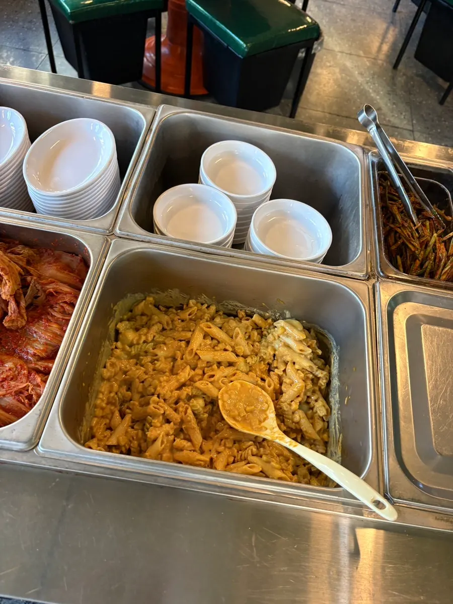 Self-serve bar with lettuce wraps and side dishes